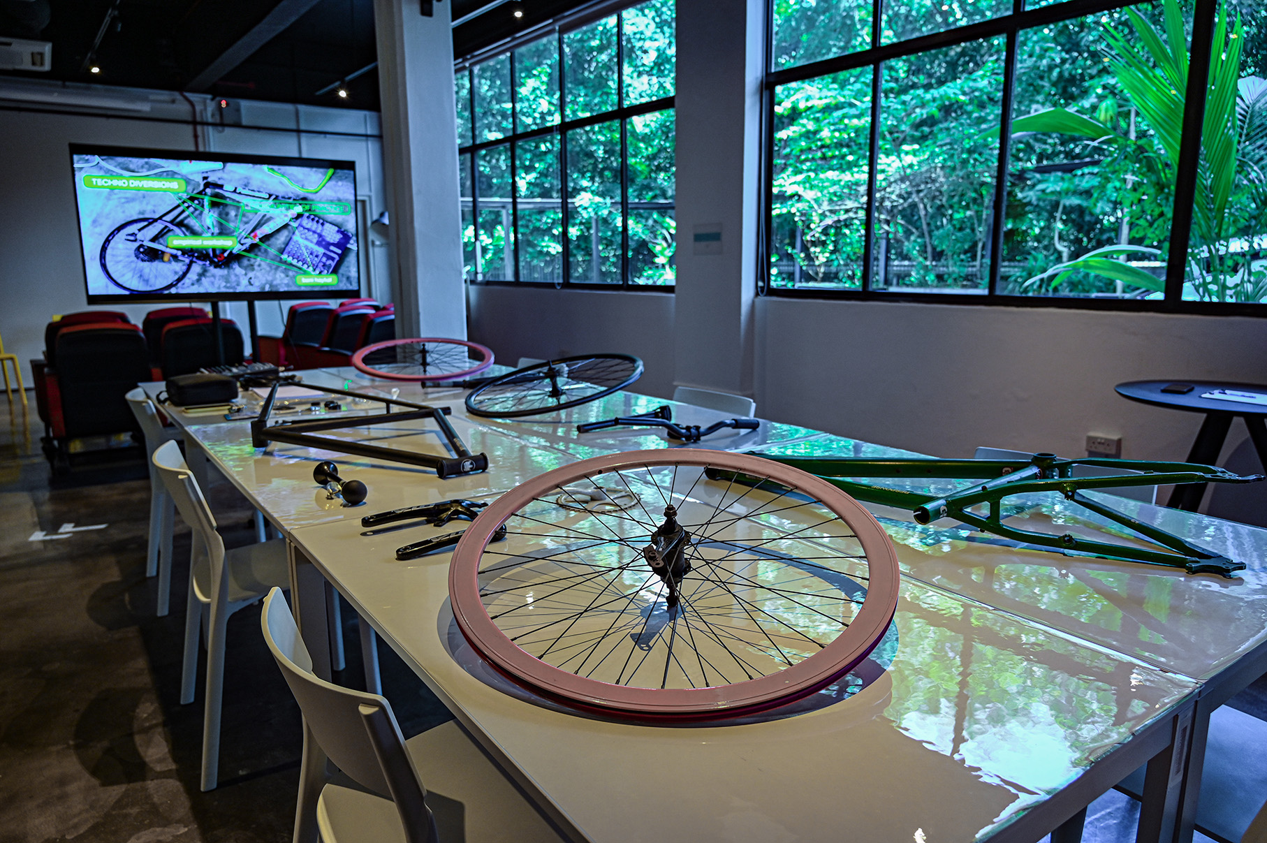 a table full of bicycle parts