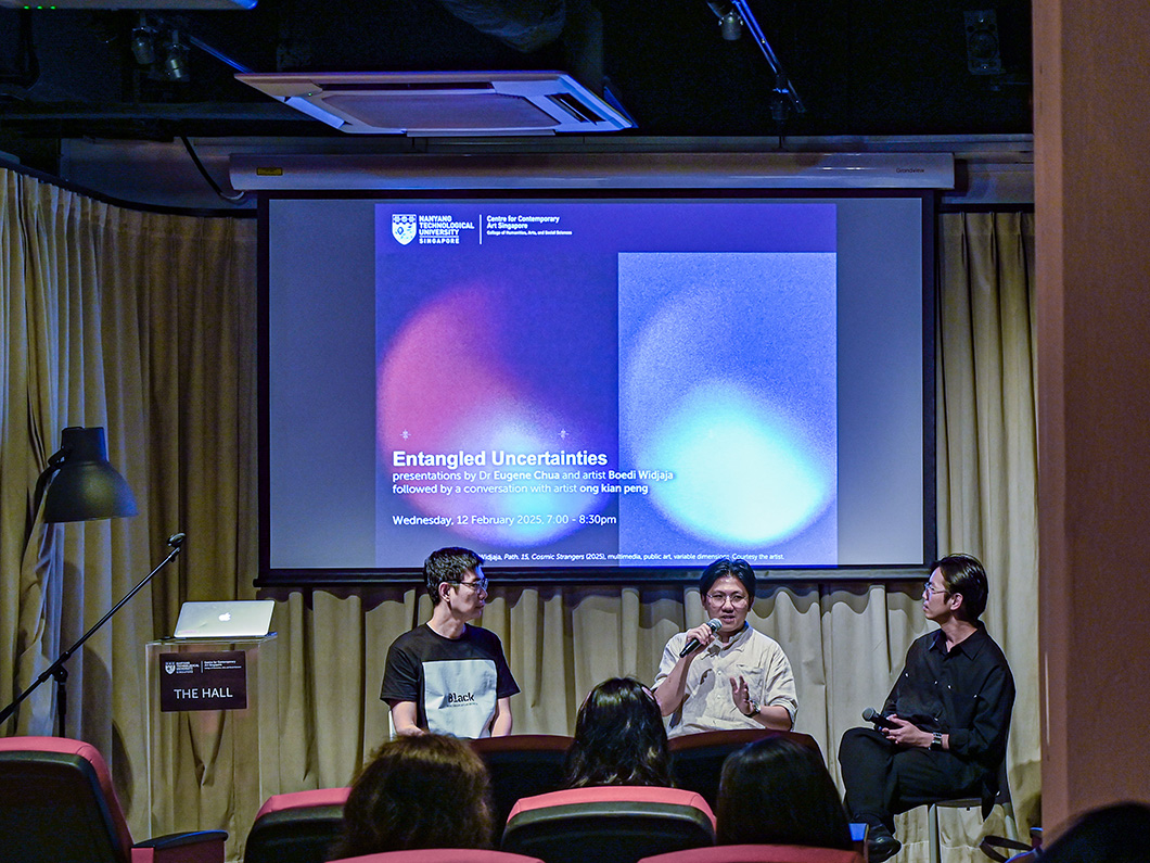 three men in a round table discussion
